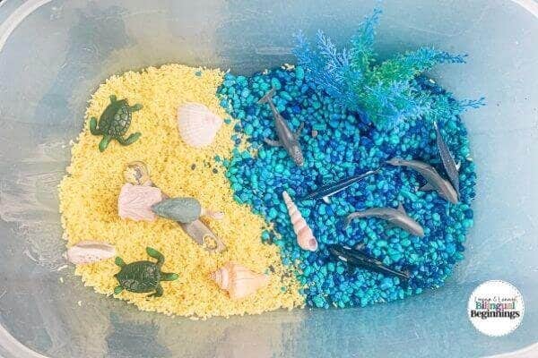 A tutorial on making a  beach-themed and ocean-themed sensory bin activity for toddlers and preschoolers.