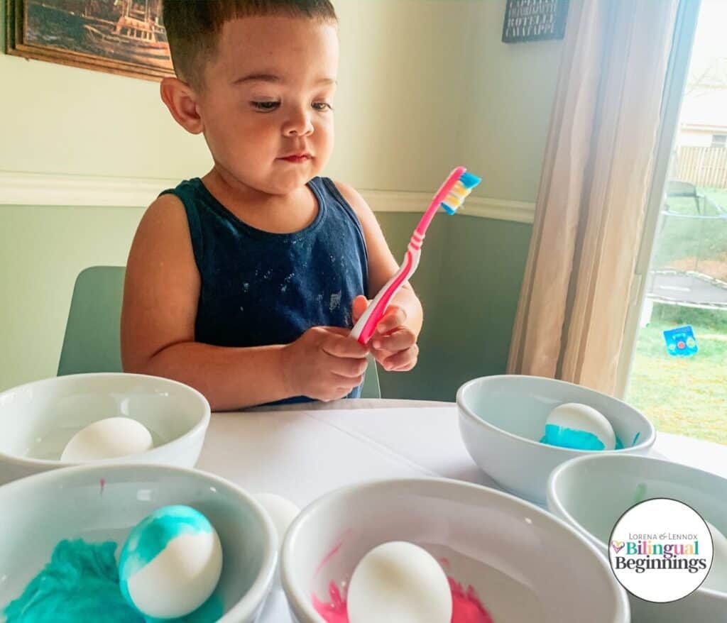 Toddler-Friendly Whipped Cream Dyed Easter Eggs #Dyingeastereggs #toddlereasteractivities #dyingeastereggswithtoddlers #diydyedeastereggs #Easter