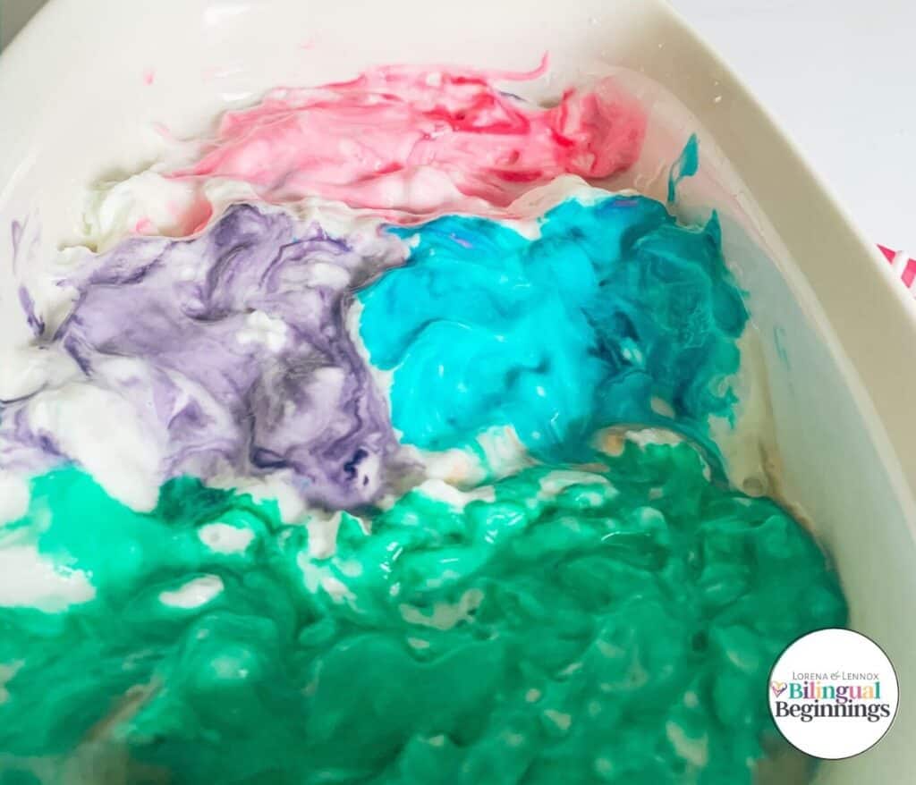 Toddler-Friendly Whipped Cream Dyed Easter Eggs #Dyingeastereggs #toddlereasteractivities #dyingeastereggswithtoddlers #diydyedeastereggs #Easter